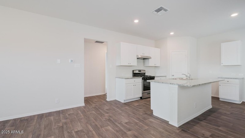 Amber kitchen and hallway to bedrooms