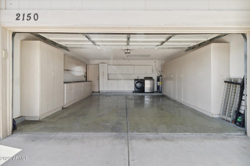 2 Car Garage w/ cabinets & Laundry