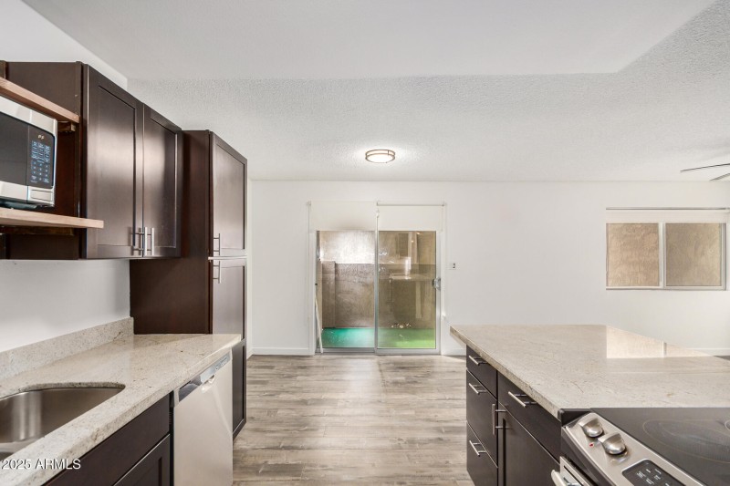 DArk Wood Cabitents w/ Granite Tops