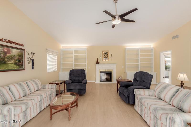 Living room with built in bookshelves