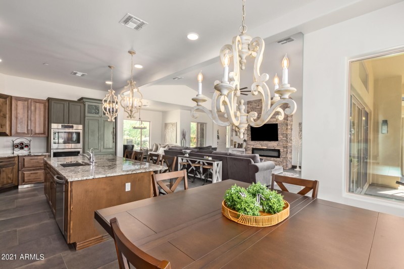 DINING AREA OPENS TO KITCHEN
