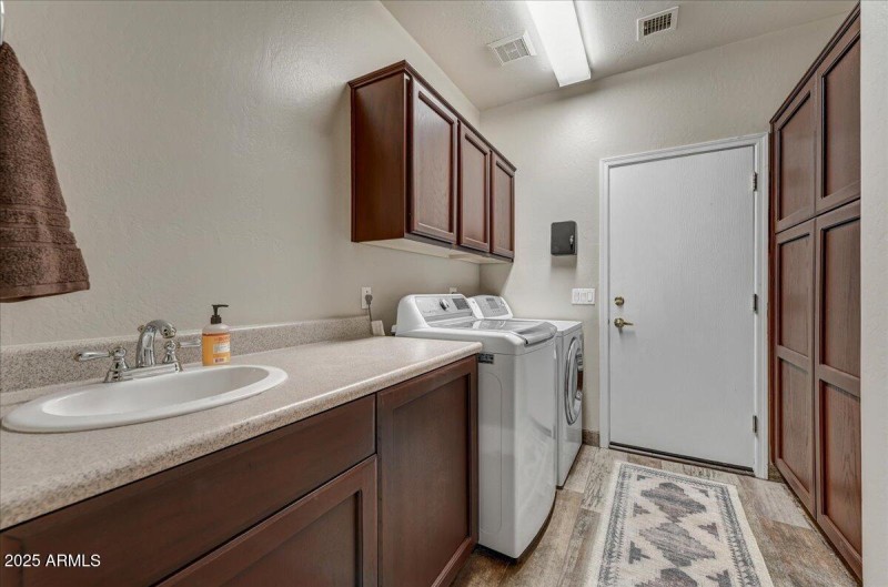 Utility Room with extensive cabinetry