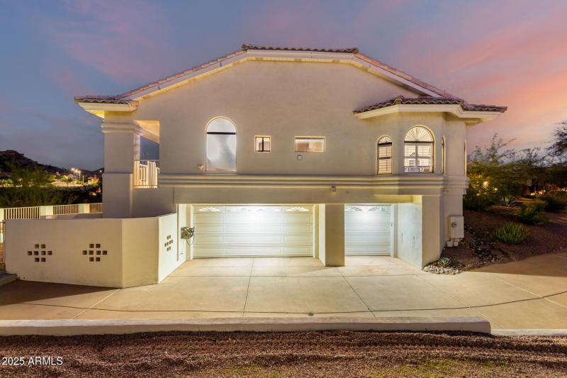 Three car garage with two driveways