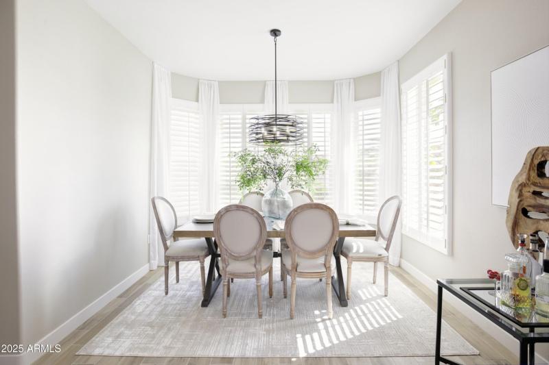 Bright Dining Room with Bay Windows