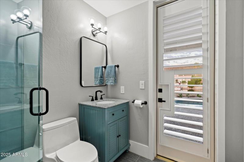 Third Bathroom with Door to Pool