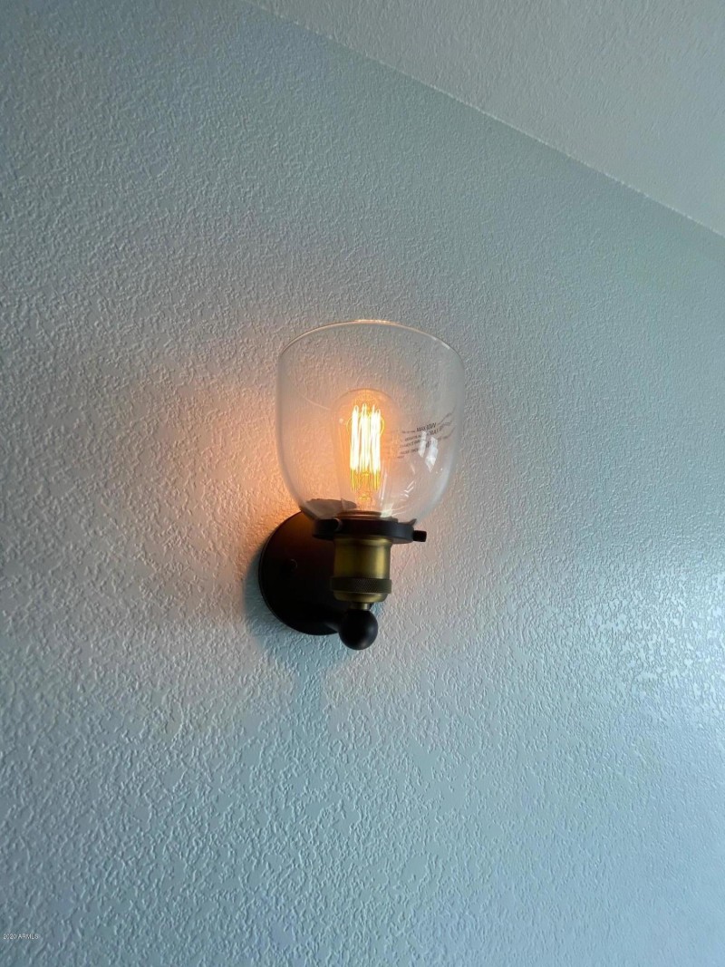 STYLISH SCONCES ALONG STAIRS