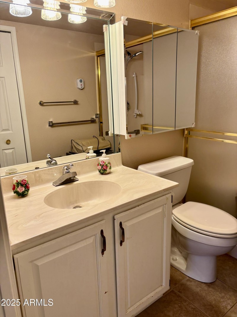 Bathroom with walk in shower and seat