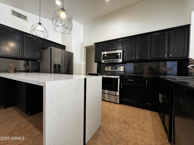 White quartz countertops with waterfall