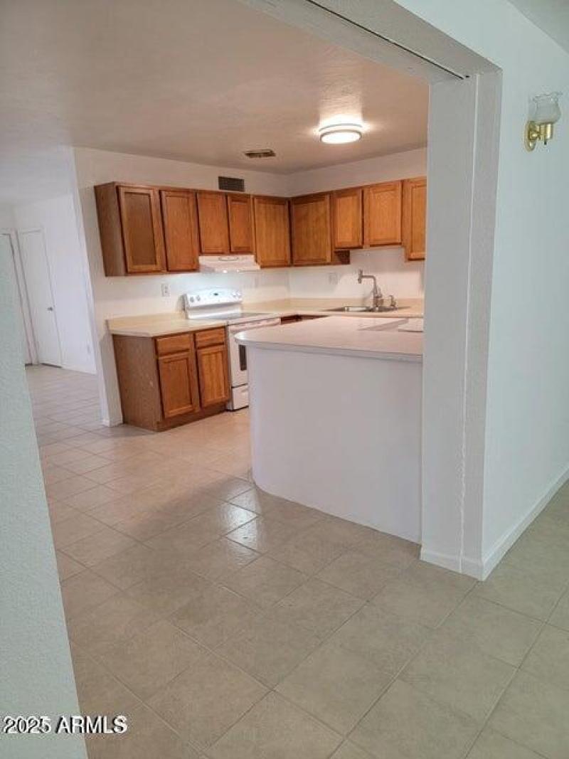 Kitchen Between Living & Family rms!