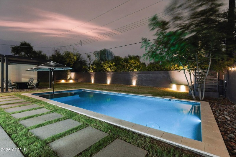 Back yard with custom lighting