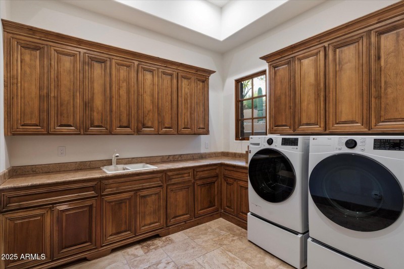 Full Laundry Room w/ Storage
