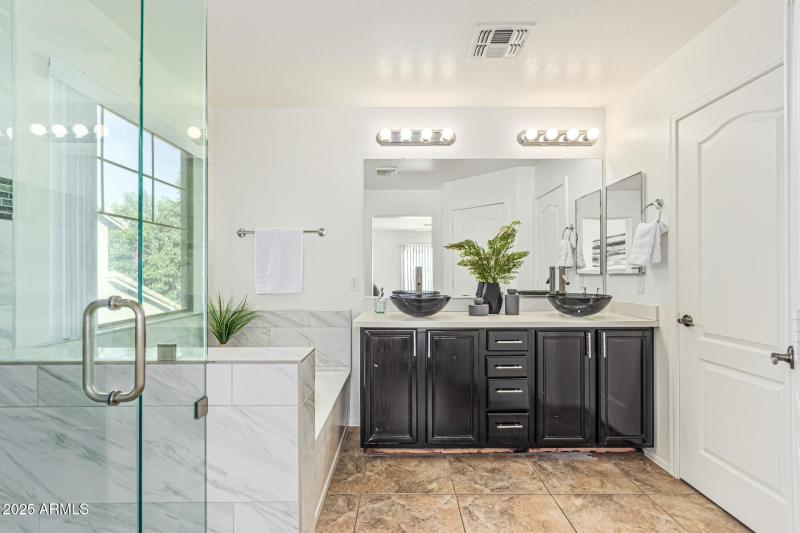 Primary bath w/linen closet & pvt toilet