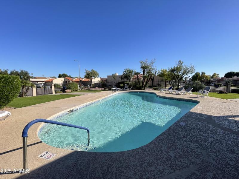 SPACIOUS DECK SURROUNDS POOL