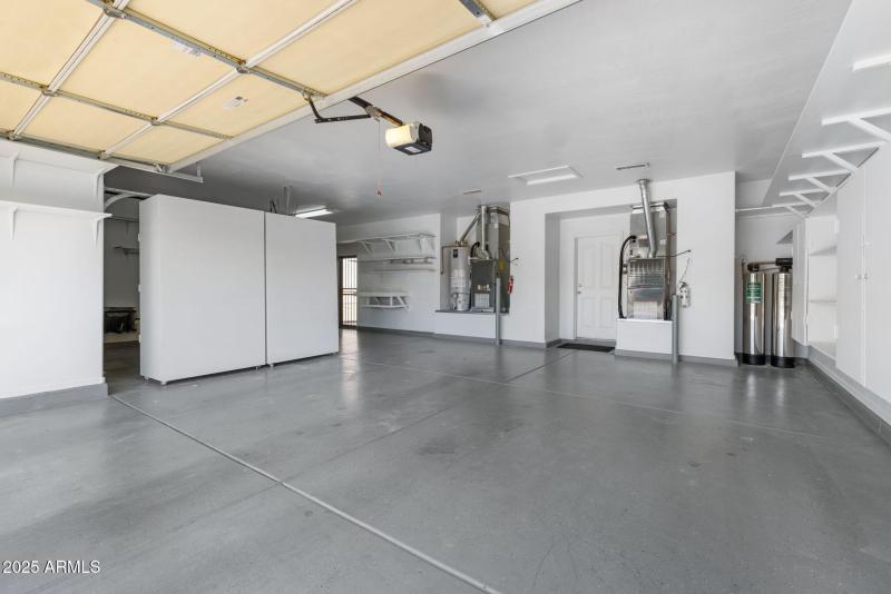 3 car Garage w Security Utility Door & W