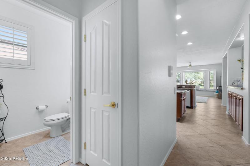 Powder Bath off Kitchen & Hall Closet