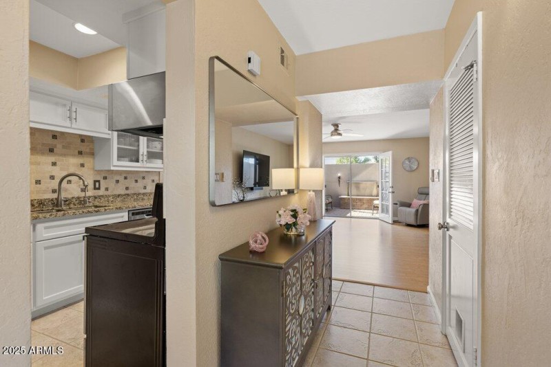 Foyer and View to Living, Kitchen