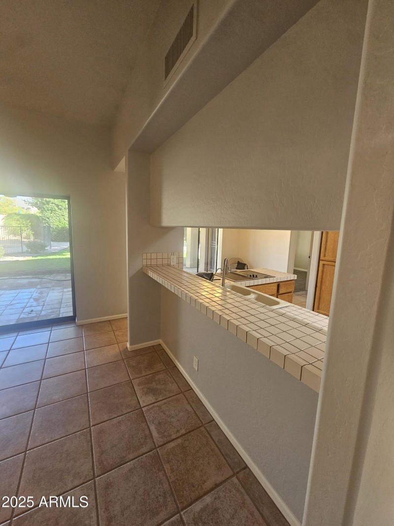 Breakfast Bar Backs to Family Room