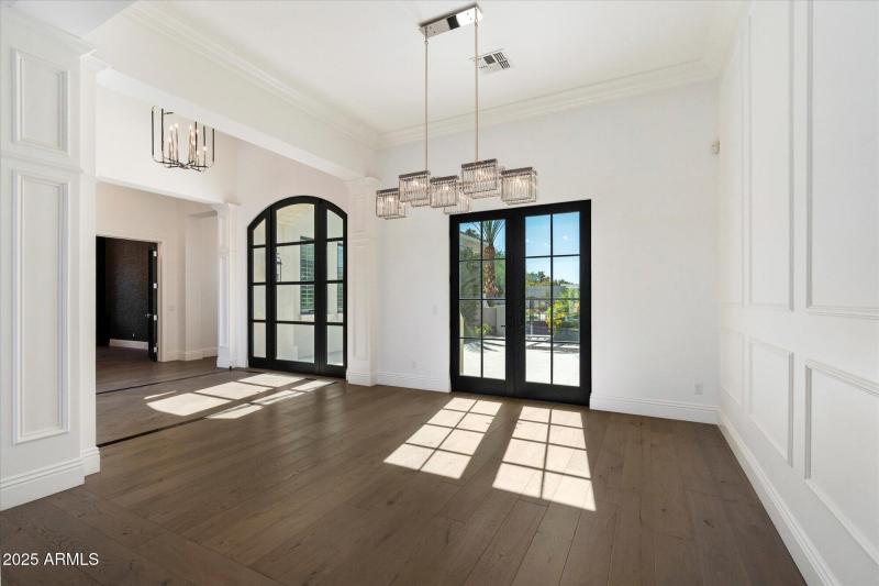 Formal dining & french doors to patio