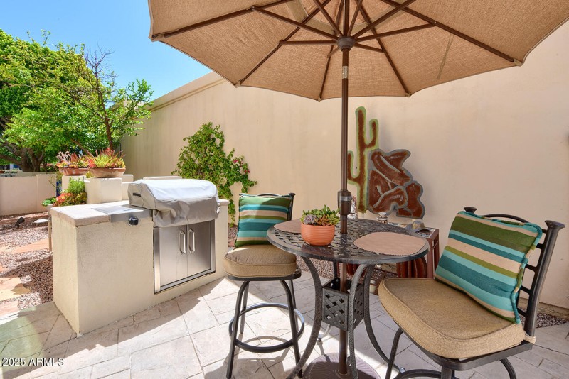 SIDE PATIO OFF KITCHEN W/BBQ