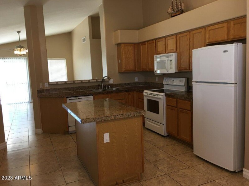Kitchen with Granite Counter and Island