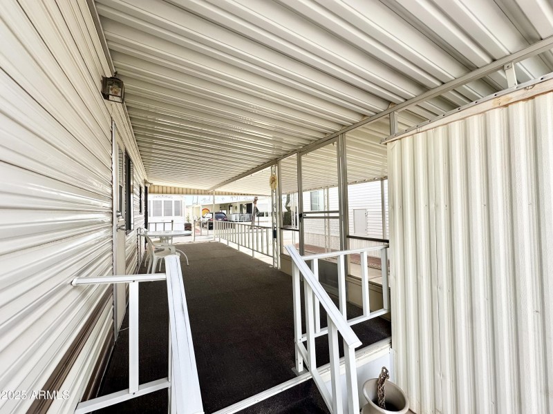 STEPS UP TO DECK FROM BACK PATIO