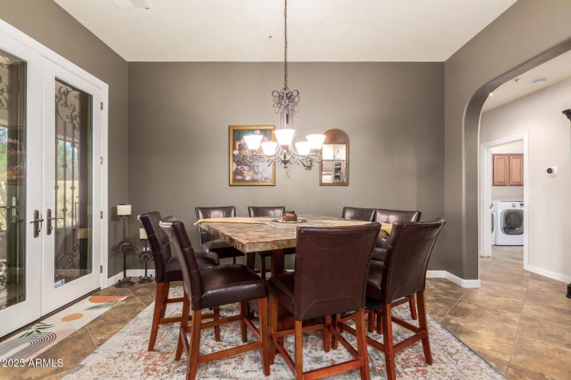 FORMAL DINING WITH FRENCH DOOR EXIT TO P