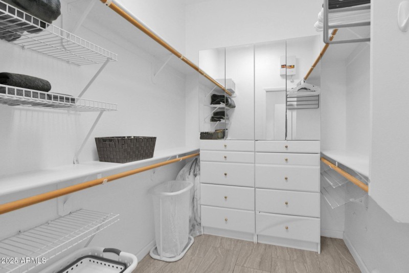 18-Primary Bedroom walk-in closet