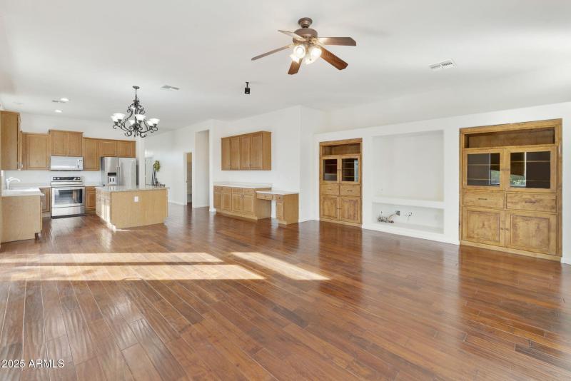 family rm w custom built in storage