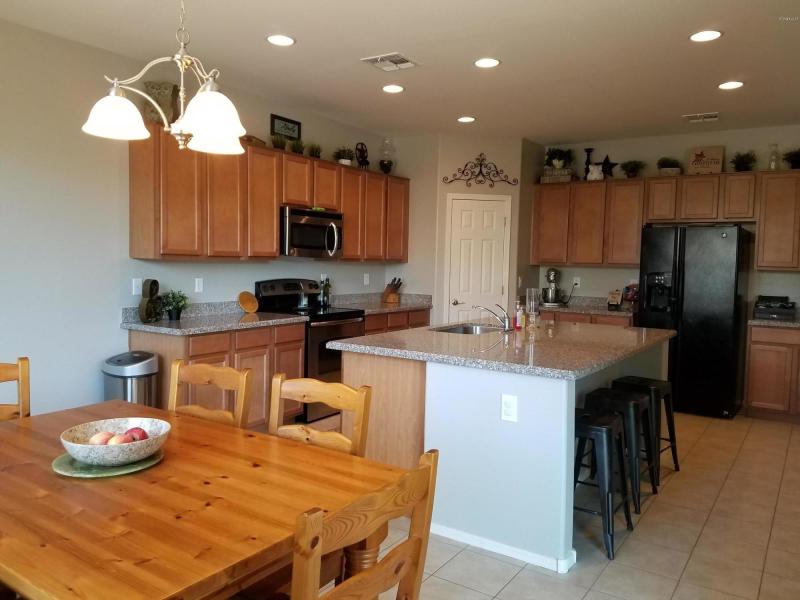 kitchen opens to dining room