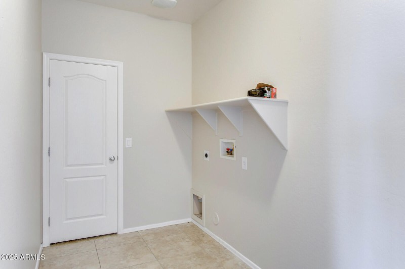 main floor laundry room and large closet