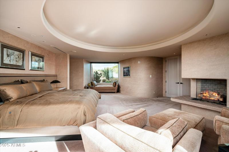 Primary ensuite with cozy fireplace