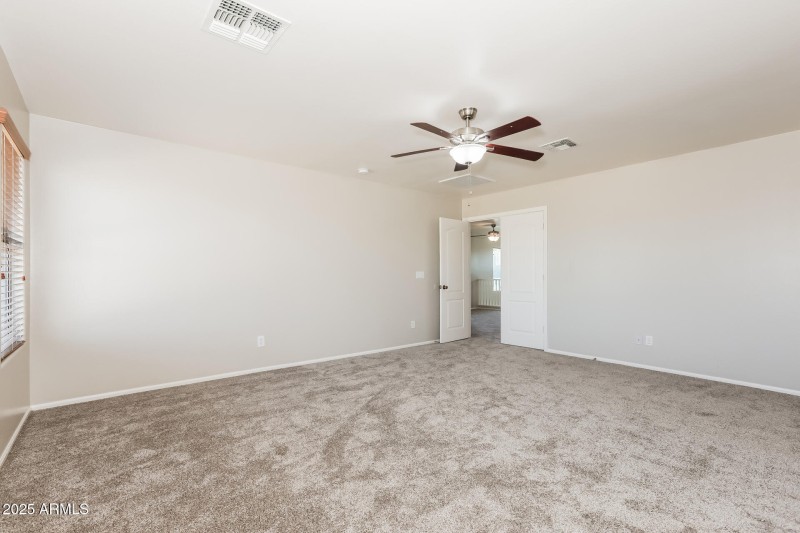 11-photo-Main-Bedroom-e61372ac-4c03-4af5