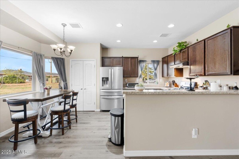 DINING AREA OPEN TO KITCHEN