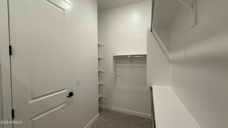 025 - Owner's Walk-In Closet