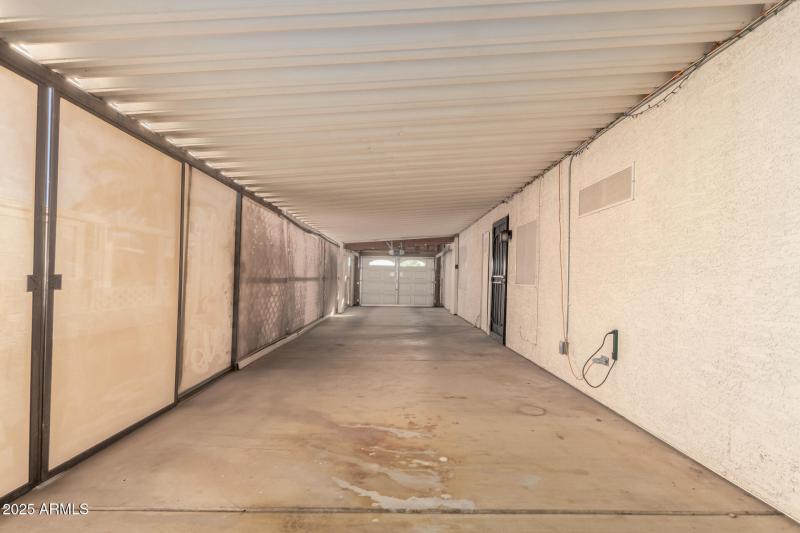 32 Carport w/ garage Door