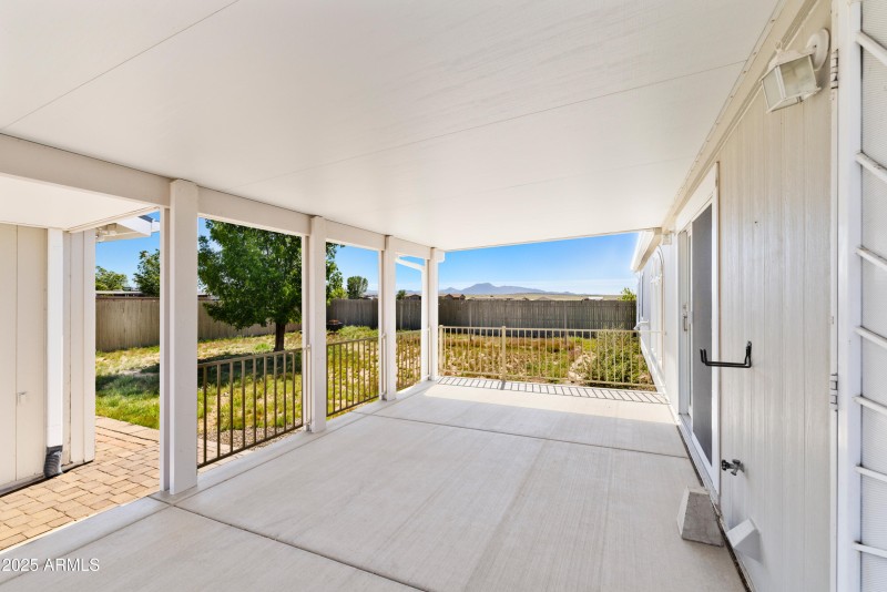 Separate smaller Fenced backyard