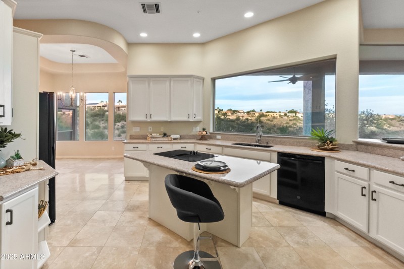 Windows and cabinets galore! Fabulous fl