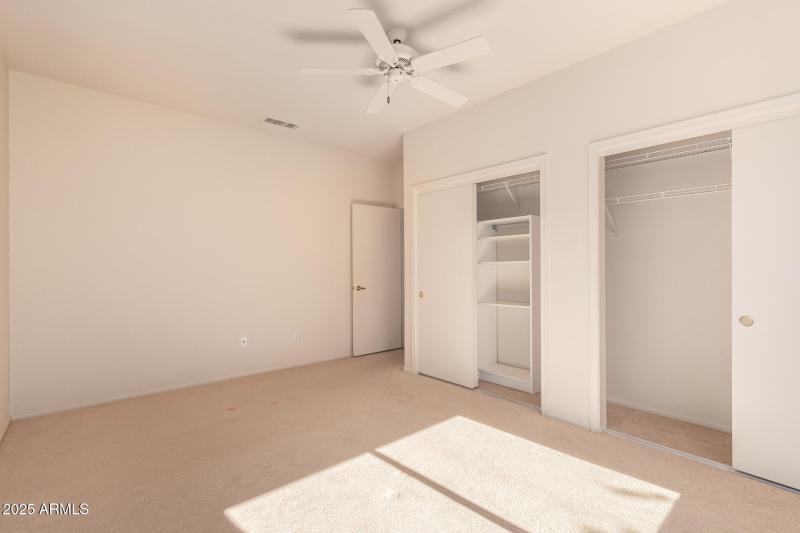 Guest Bedroom With Double Closet