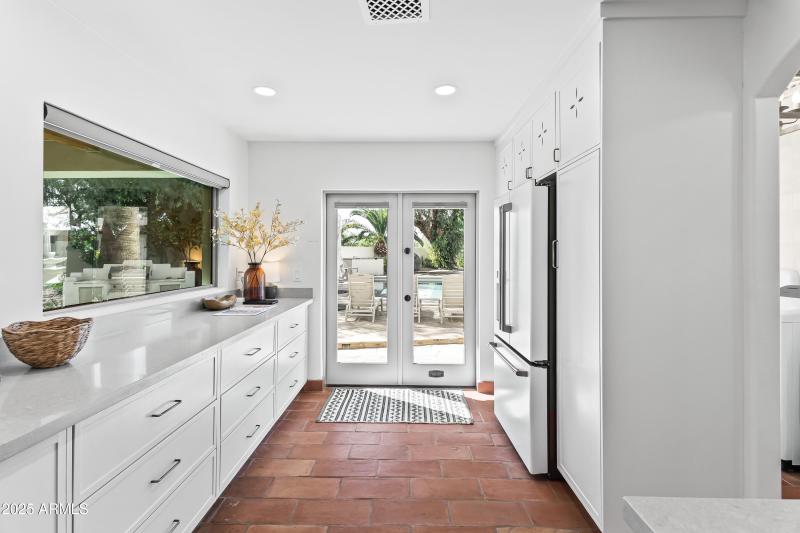 Kitchen + French Doors to Backyard