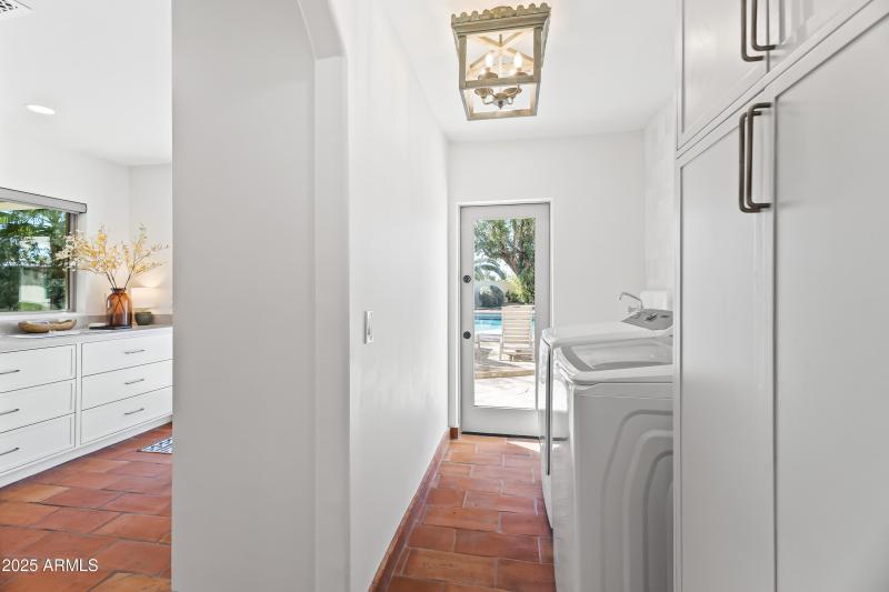 Laundry with Sink + Backyard Access