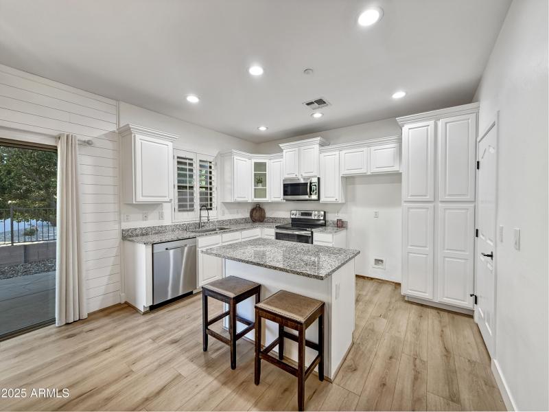 Bright Kitchen with Backyard View
