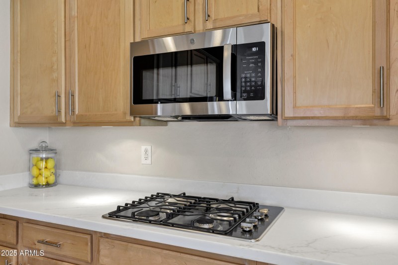Gas cooktop and microwave