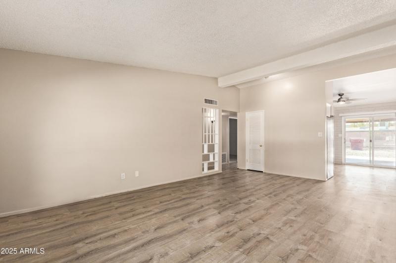 Living room facing kitchen