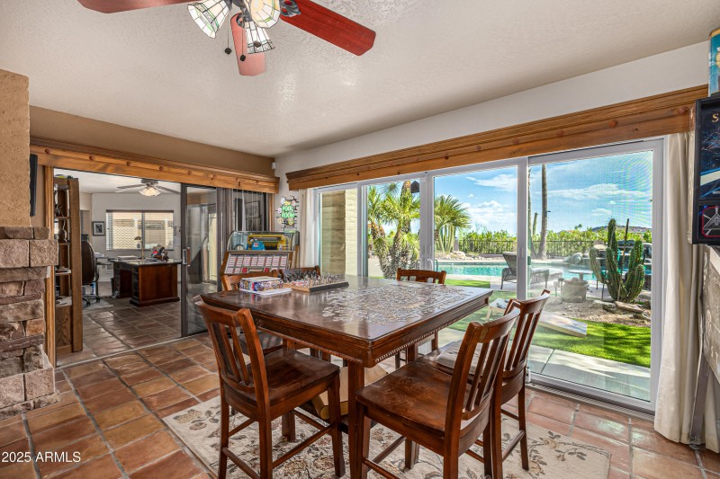 16557 E Nicklaus Dr Game Room into Den :