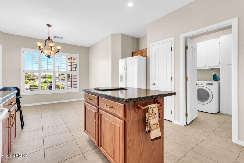 Kitchen entry to Garage and Laundry