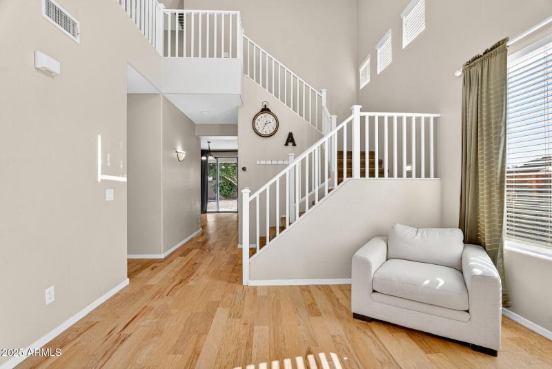 Staircase to 3 beds & bonus room