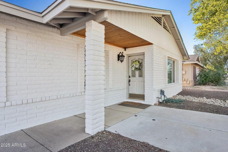 Front entry with cozy patio