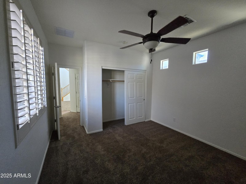 bedroom 2 with walk in closet