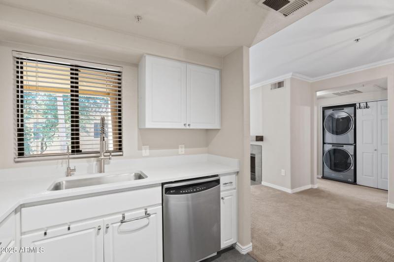 Kitchen opens to Living Room