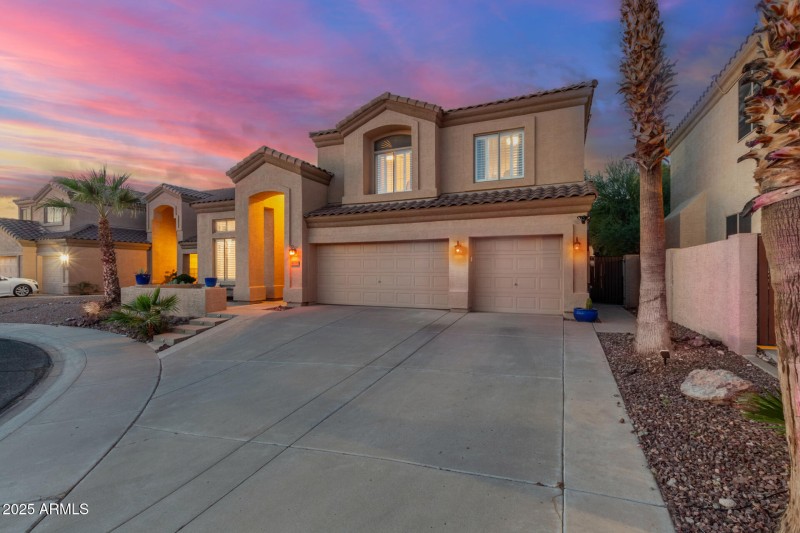 Front of home at sunset